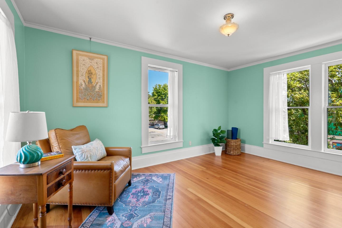 505 Cayuga Street Santa Cruz, CA 95062 - Photo 26 of 57 a living room with furniture and wooden floor