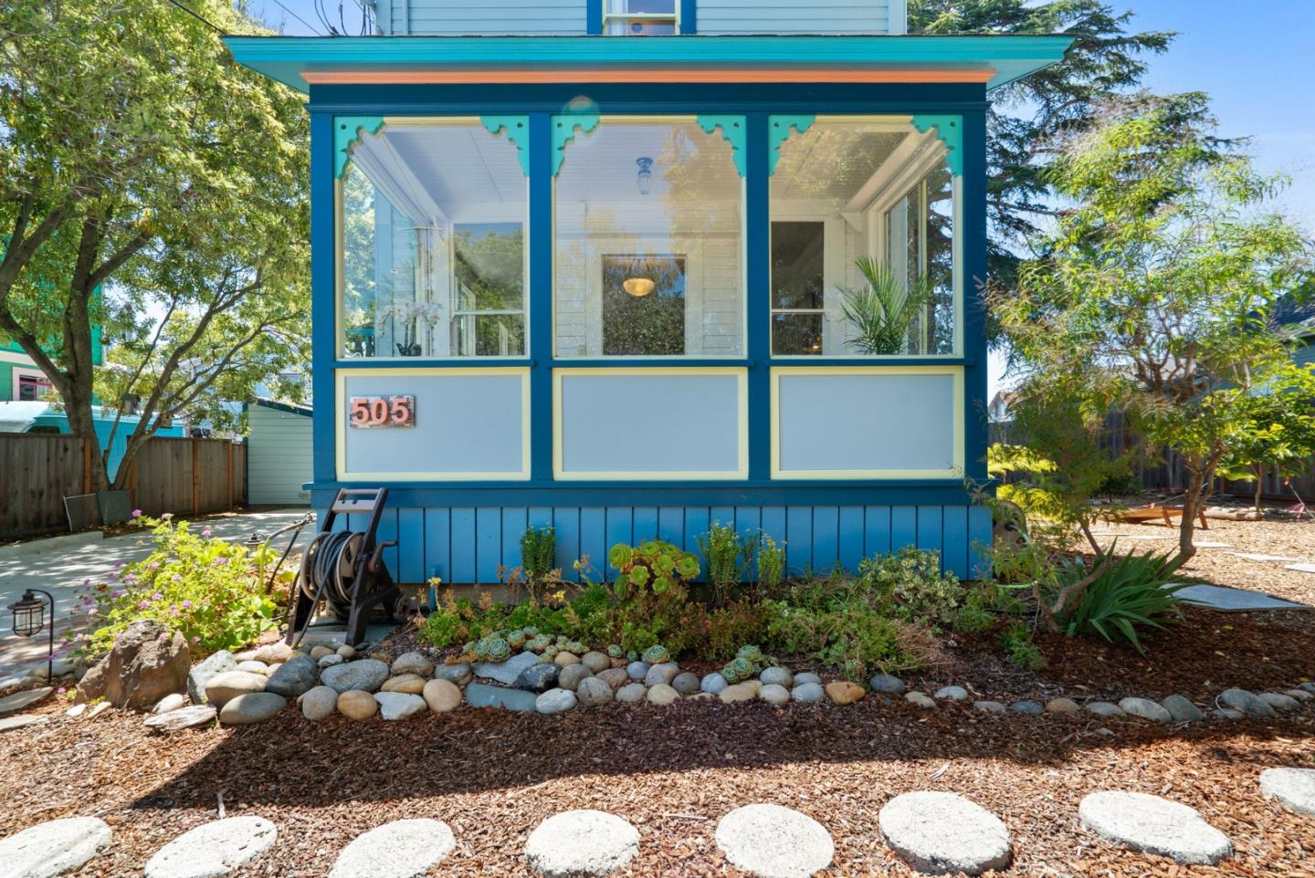 505 Cayuga Street Santa Cruz, CA 95062 - Photo 3 of 57 a front view of a house with a yard