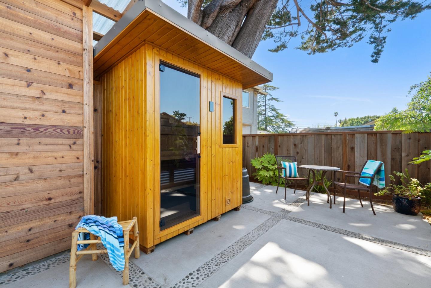 505 Cayuga Street Santa Cruz, CA 95062 - Photo 44 of 57 a view of a chairs in the back yard of the house