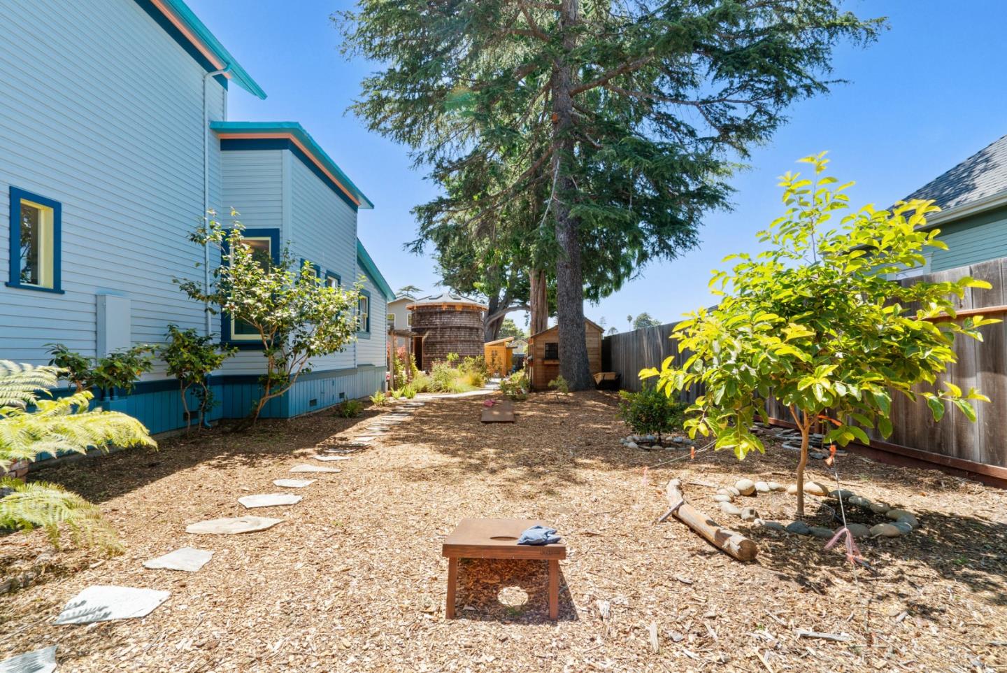 505 Cayuga Street Santa Cruz, CA 95062 - Photo 49 of 57 a view of a backyard with plants and a garden