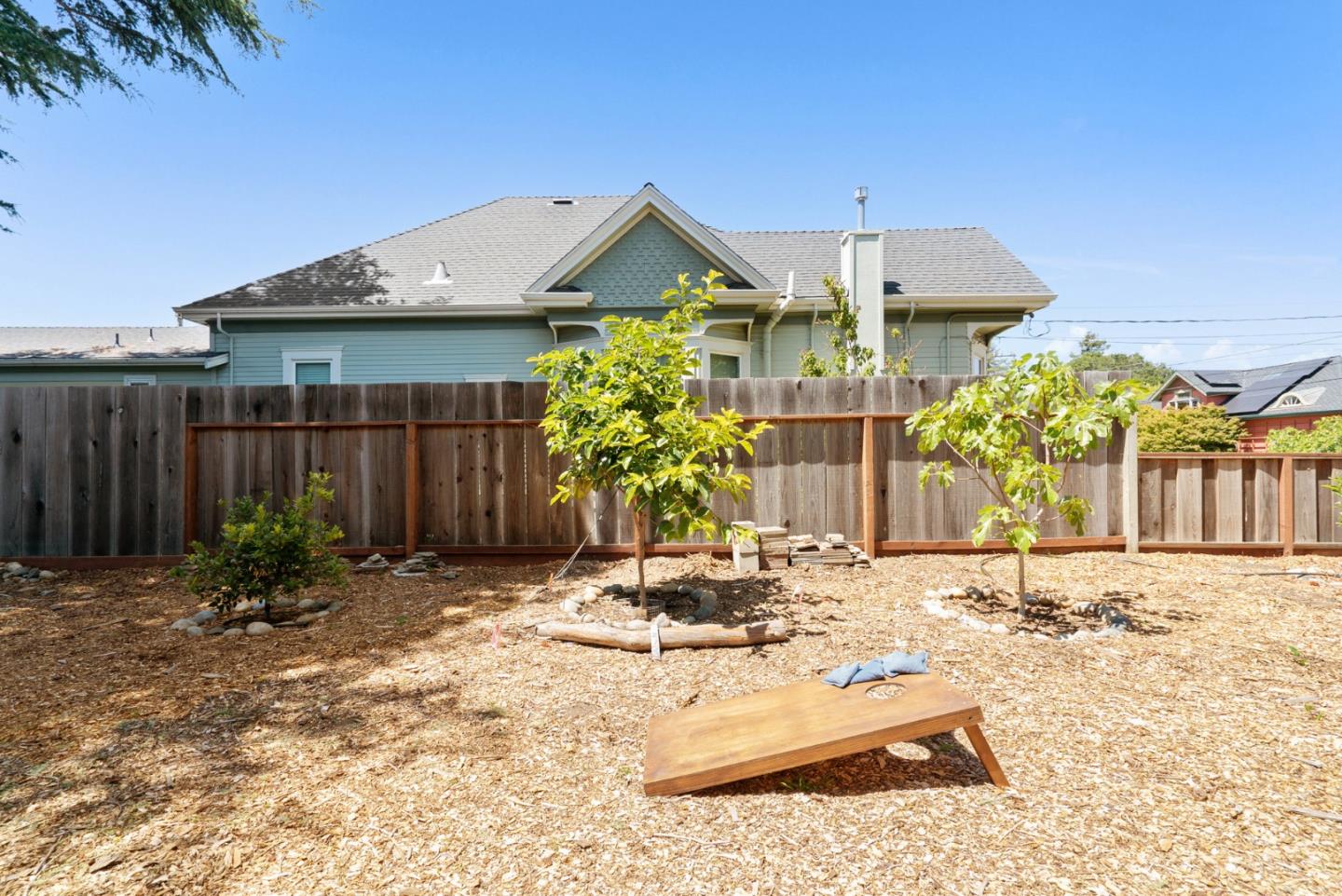 505 Cayuga Street Santa Cruz, CA 95062 - Photo 50 of 57 a view of a house with a yard and sitting area
