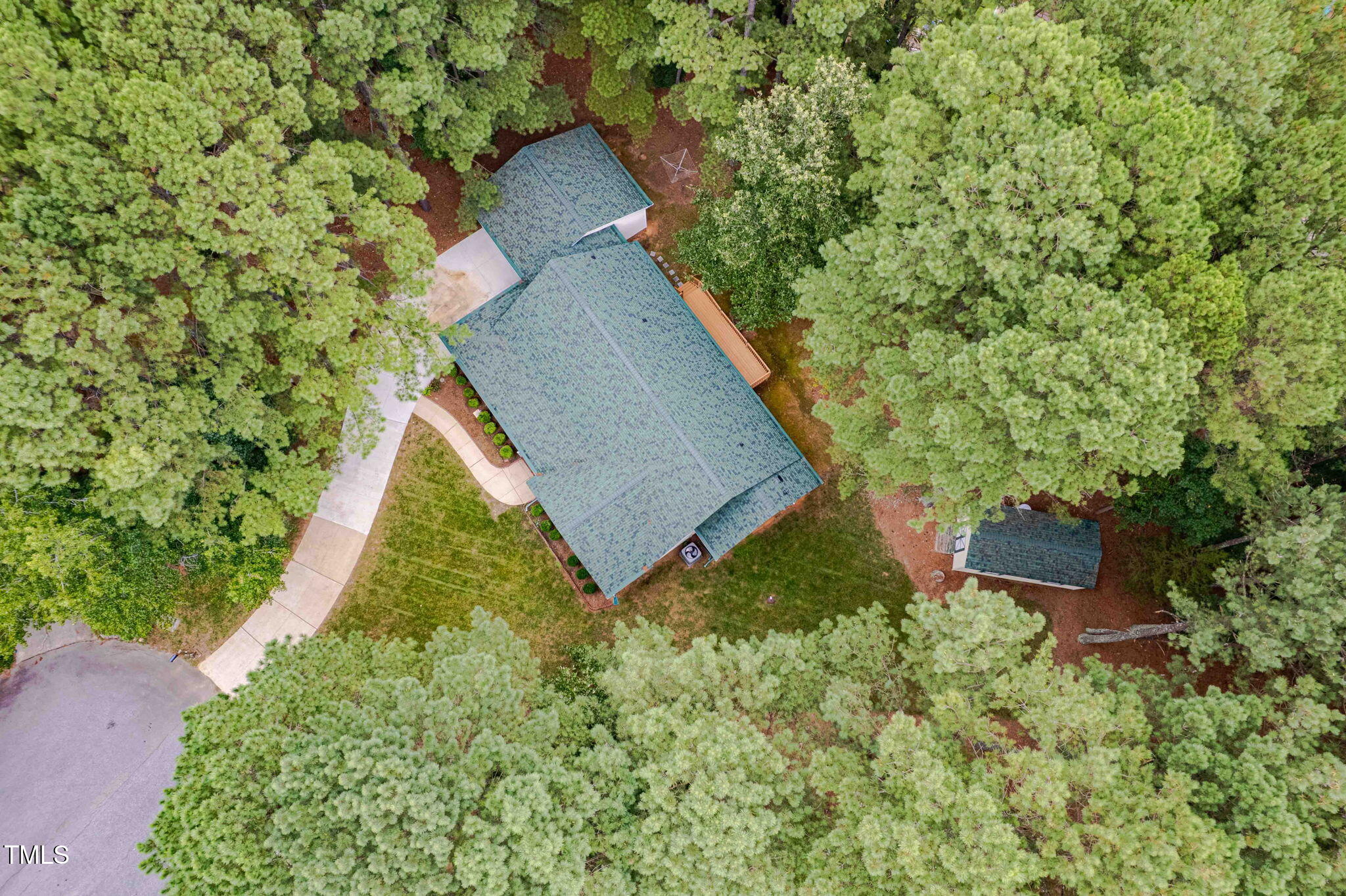 4700 Carolton Drive Raleigh, NC 27606 - Photo 28 of 29 a view of a house with a yard
