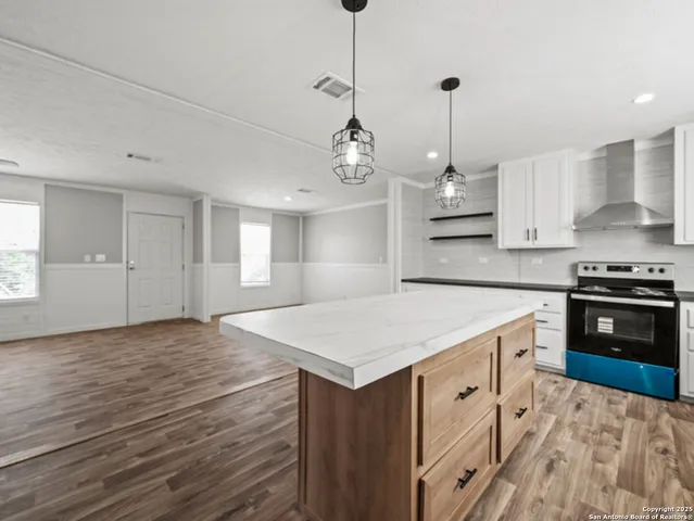 a very nice looking room with a wooden floor