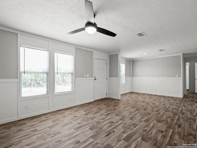 a view of kitchen with wooden floor