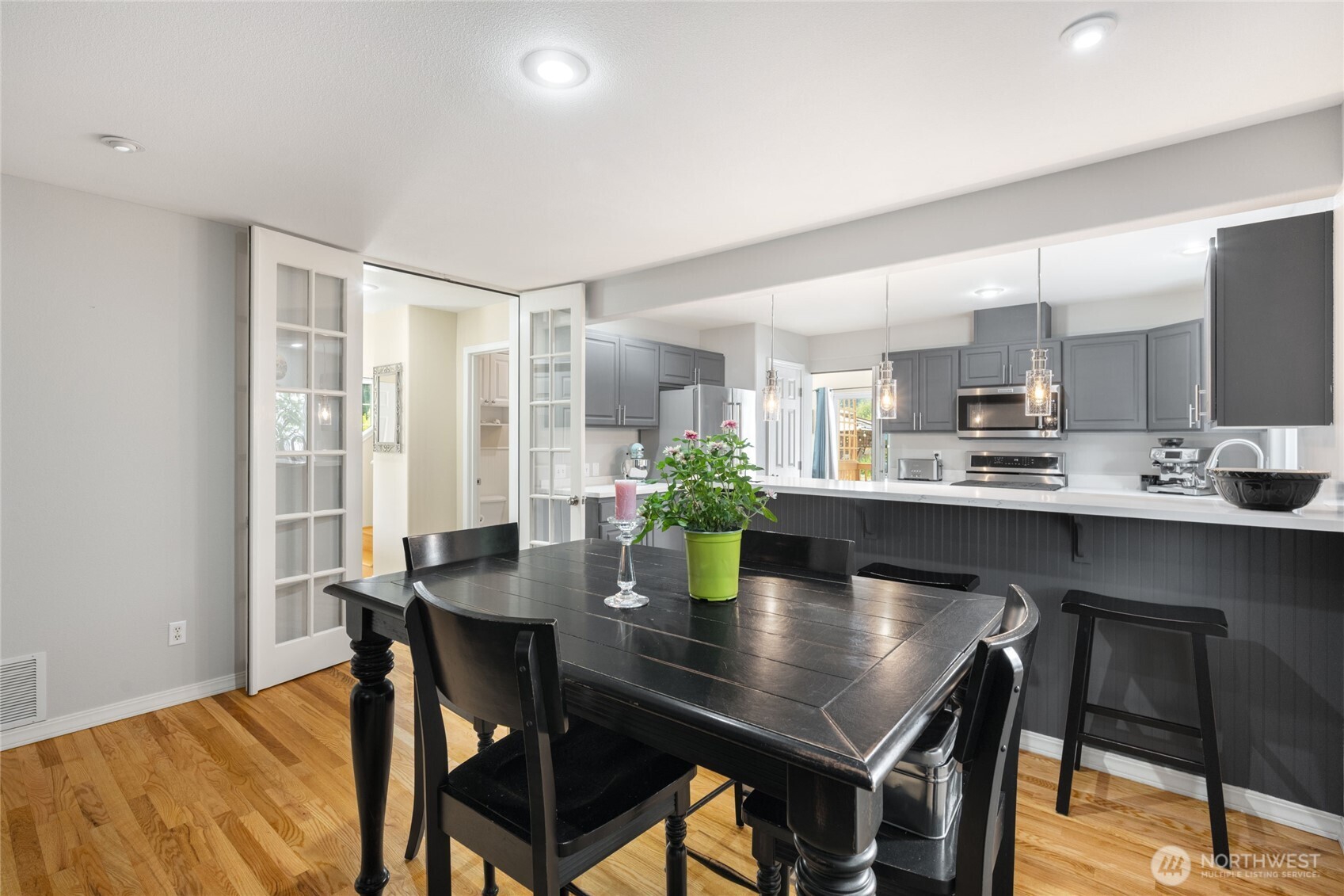 16267 16th Avenue Southwest Burien, WA 98166 - Photo 15 of 40 a kitchen with a table and chairs in it