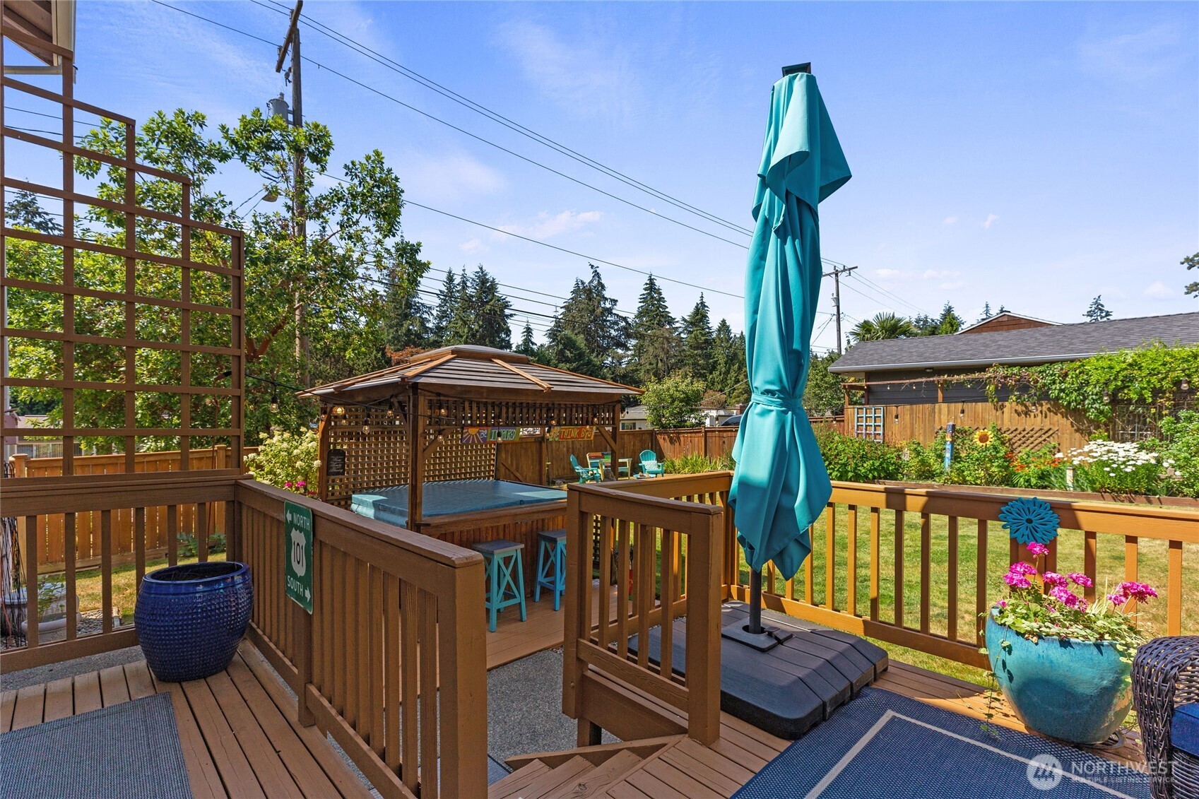 16267 16th Avenue Southwest Burien, WA 98166 - Photo 17 of 40 a view of a deck with wooden floor and outdoor seating