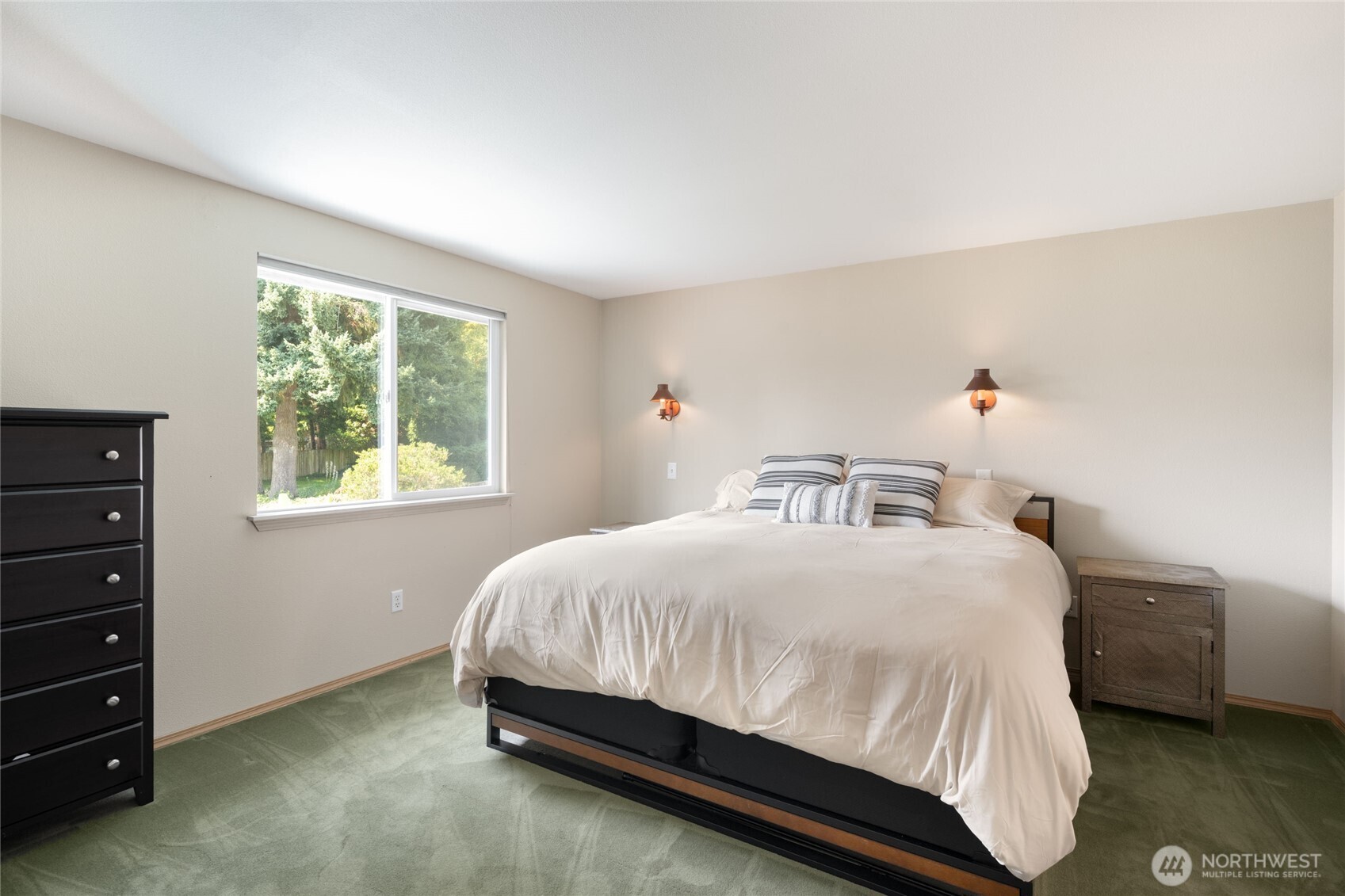 16267 16th Avenue Southwest Burien, WA 98166 - Photo 24 of 40 a bedroom with a bed and a window