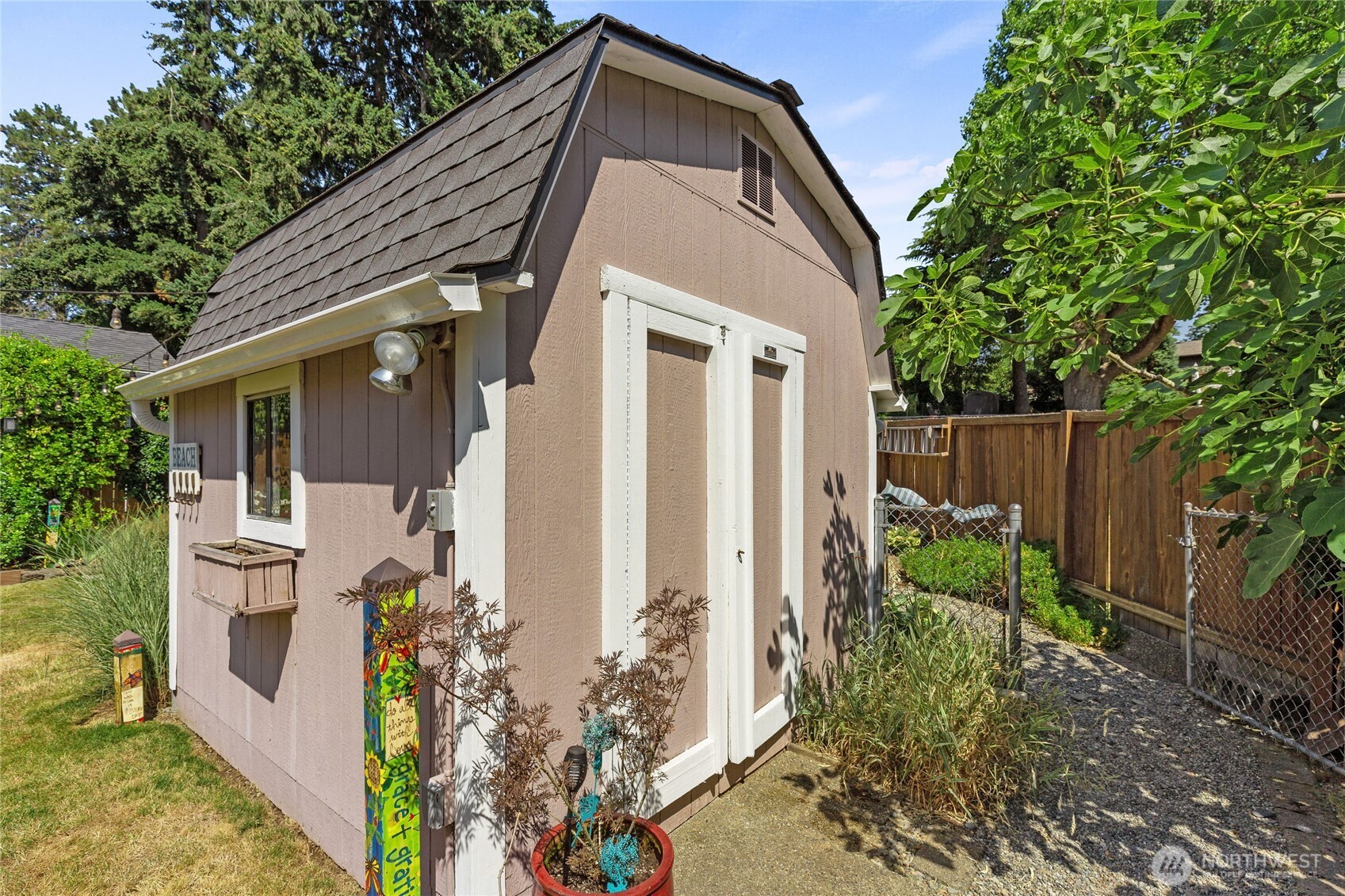 16267 16th Avenue Southwest Burien, WA 98166 - Photo 33 of 40 a view of a house with wooden fence