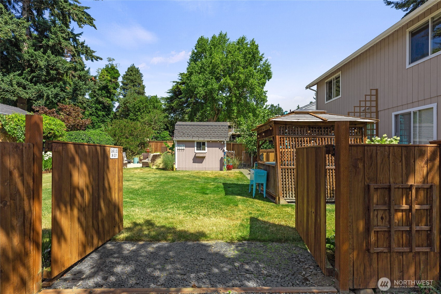 16267 16th Avenue Southwest Burien, WA 98166 - Photo 36 of 40 a view of a house with backyard and wooden fence