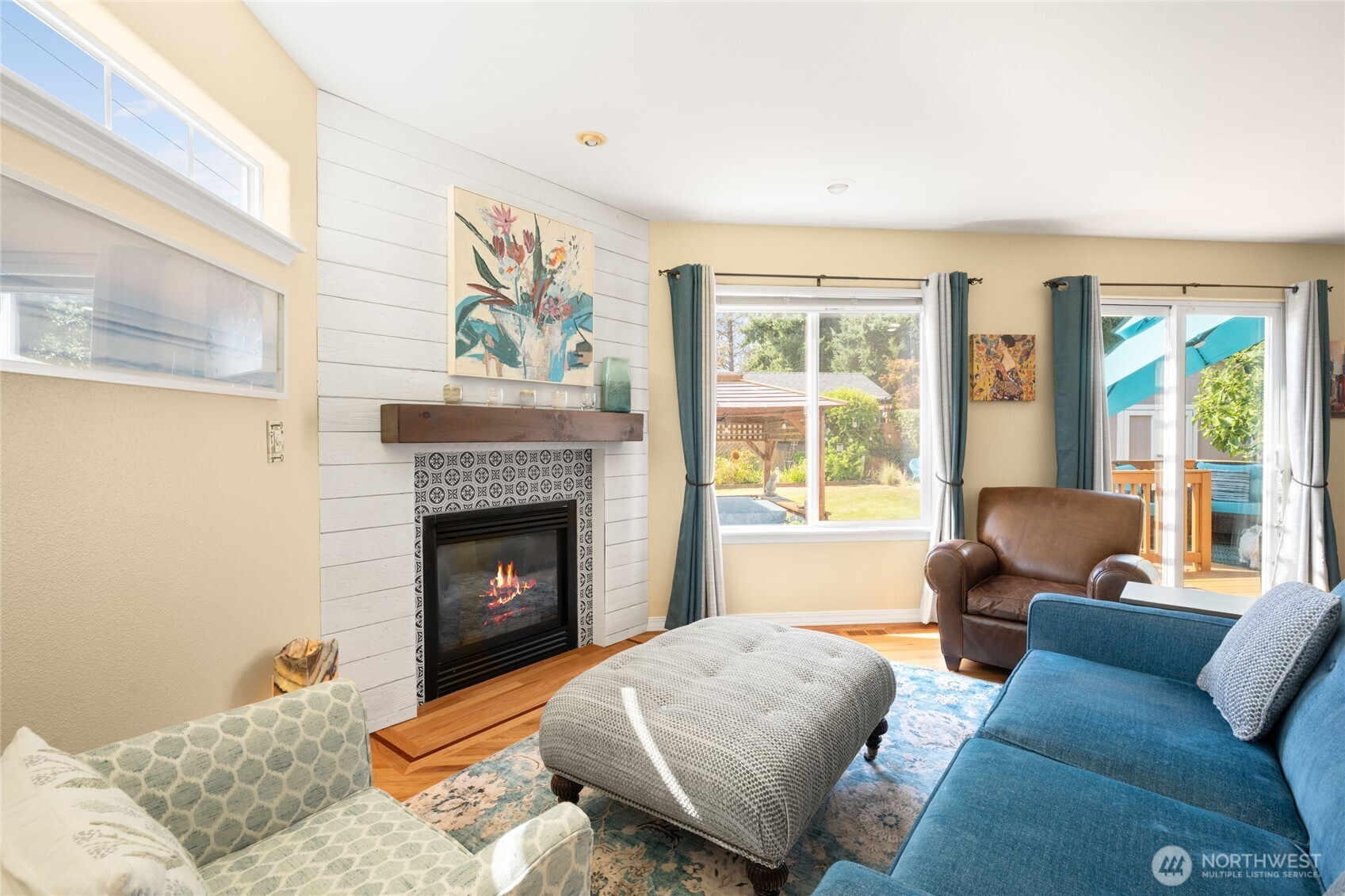 16267 16th Avenue Southwest Burien, WA 98166 - Photo 7 of 40 a living room with furniture and a fireplace