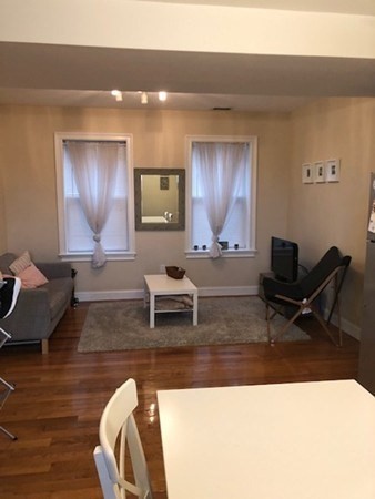 61 Wait Street, Unit 3 Boston, MA 02120 - Photo 1 of 11 a living room with furniture