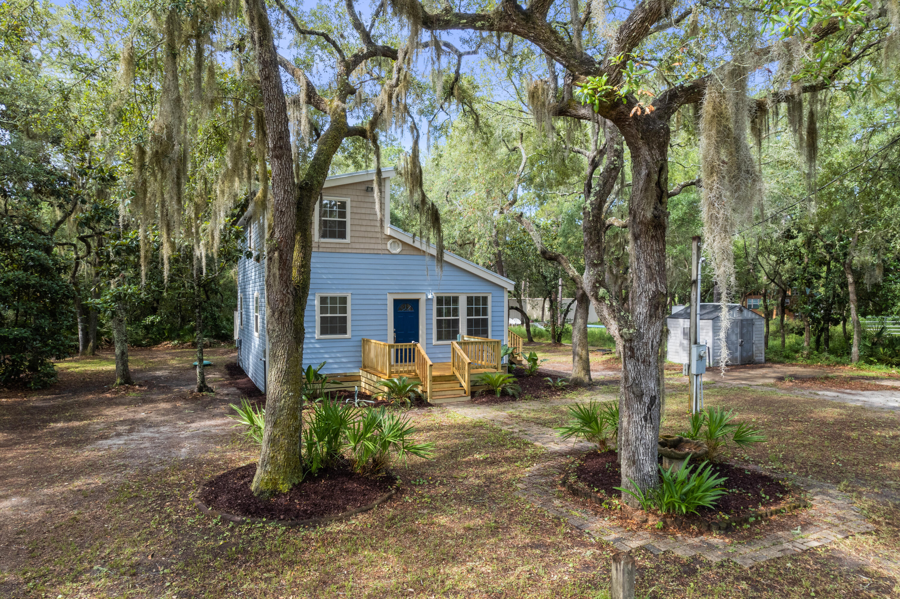 200 East Harborview Road Santa Rosa Beach, FL 32459 - Photo 1 of 20 a view of a house with backyard
