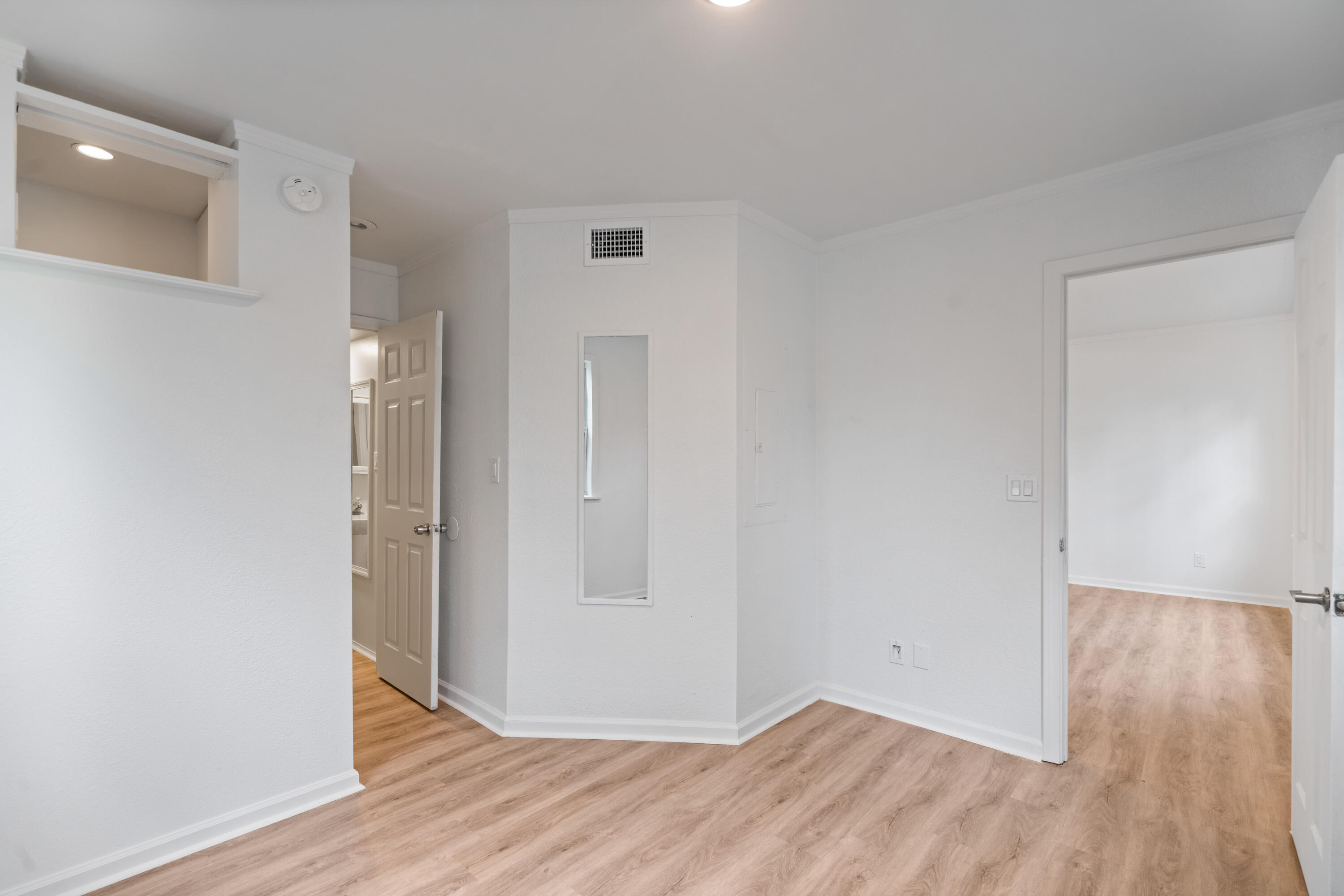 200 East Harborview Road Santa Rosa Beach, FL 32459 - Photo 11 of 20 wooden floor in an empty room