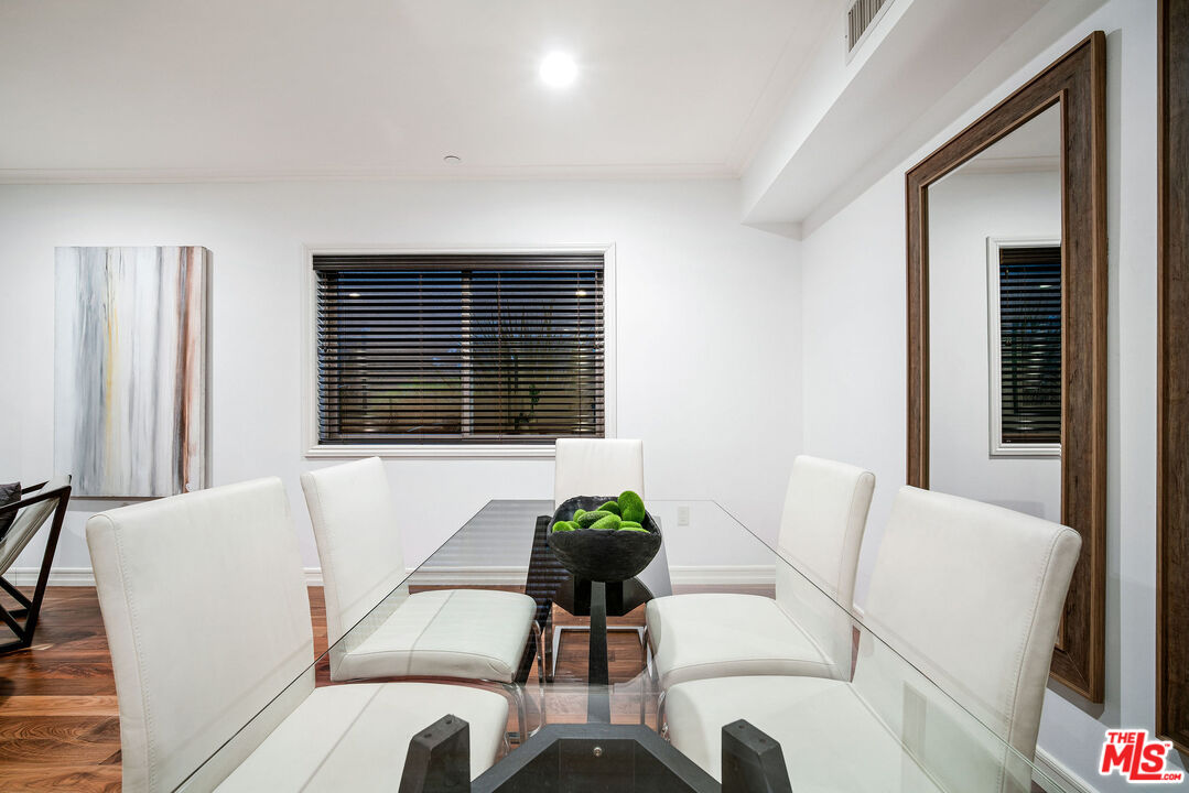 1420 South Bundy Drive, Unit 101 Los Angeles, CA 90025 - Photo 18 of 37 a living room with furniture and a large window