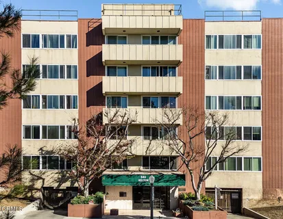 front view of a building with a street