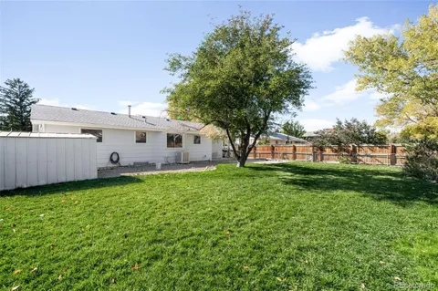 a view of a backyard with garden