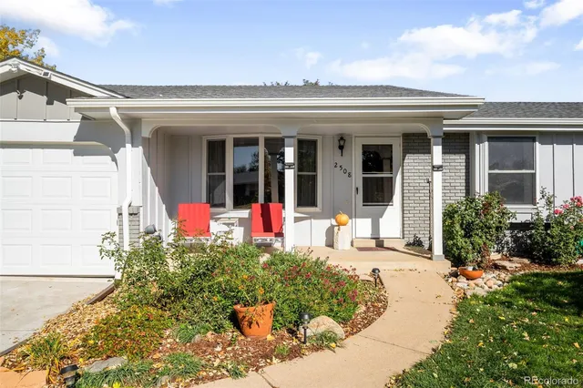 a front view of a house with a porch