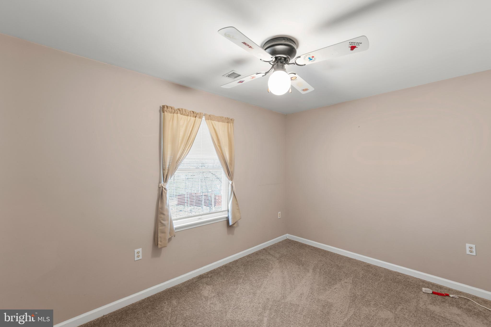 430 Babbs Mountain Road Winchester, VA 22603 - Photo 31 of 49 an empty room with windows and fan