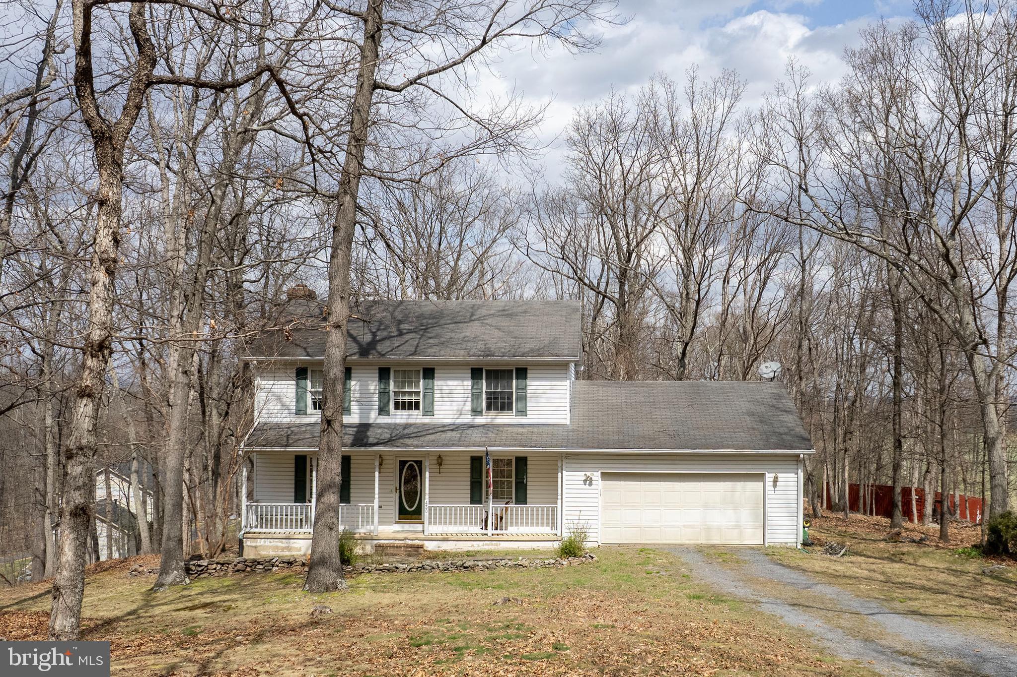 430 Babbs Mountain Road Winchester, VA 22603 - Photo 42 of 49 a front view of a house with garden
