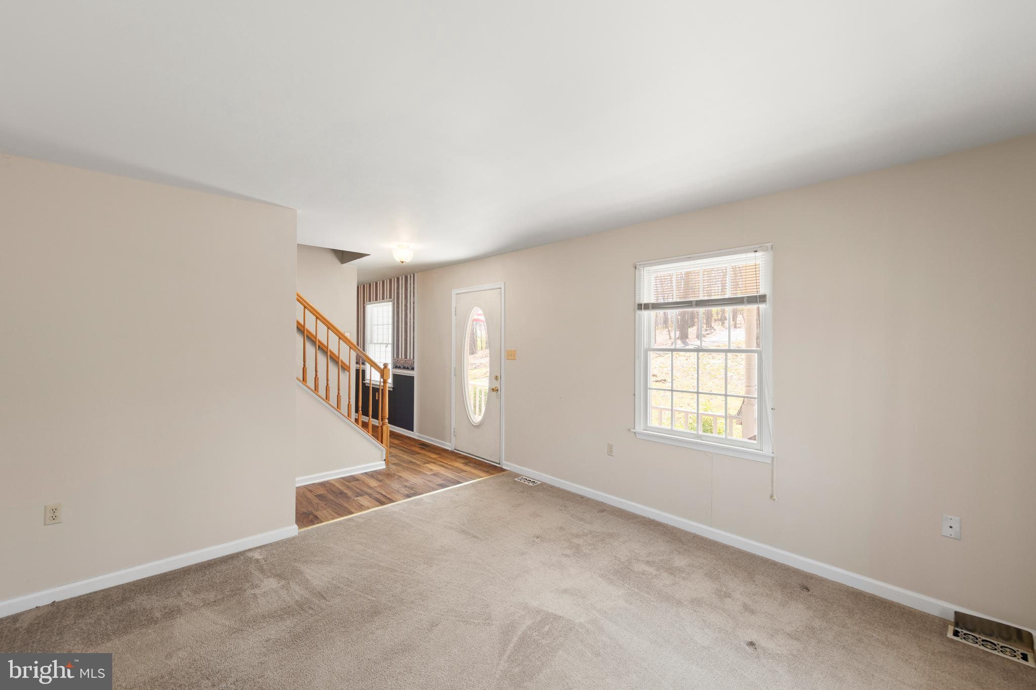 430 Babbs Mountain Road Winchester, VA 22603 - Photo 5 of 49 an empty room with windows