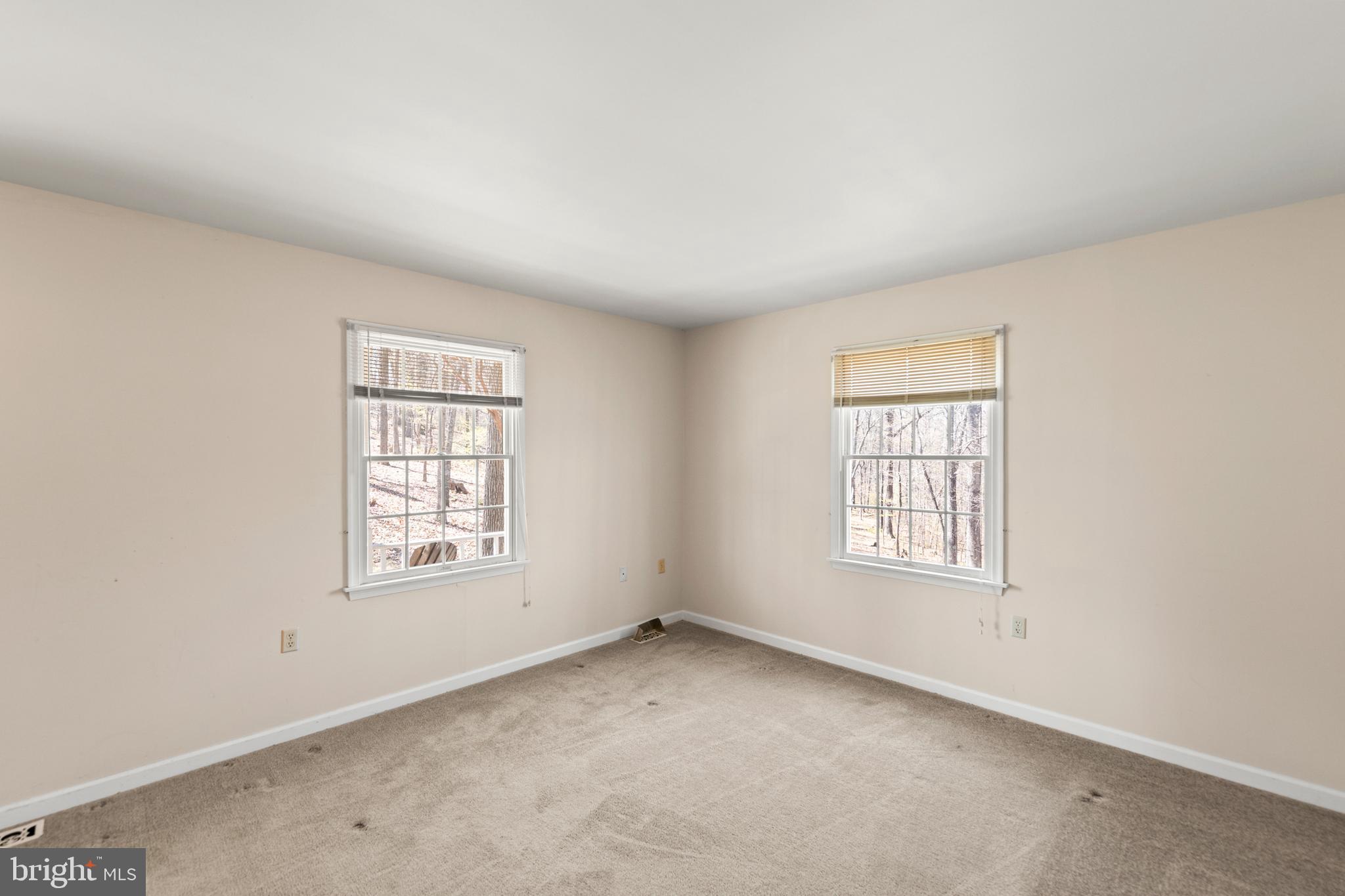 430 Babbs Mountain Road Winchester, VA 22603 - Photo 10 of 49 an empty room with windows