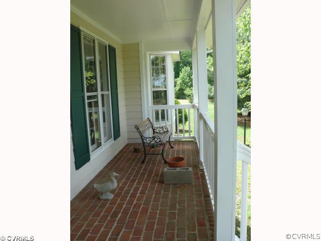 2371 Old Hanover Road Sandston, VA 23150 - Photo 2 of 12 Porch - Brick porch with vinyl railing.