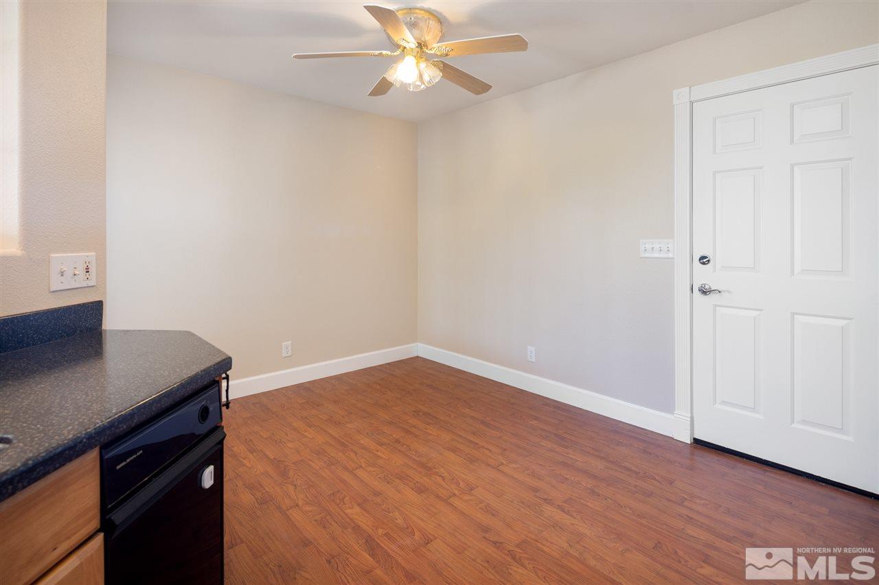 21859 Adobe Road Reno, NV 89521 - Photo 9 of 40 wooden floor in an empty room