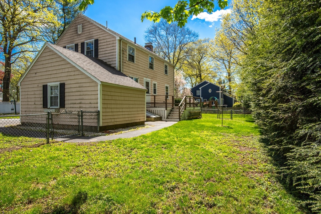 51 Pine Ridge Road Reading, MA 01867 - Photo 27 of 30 a view of backyard with a garden
