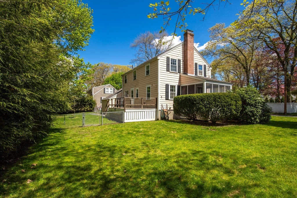 51 Pine Ridge Road Reading, MA 01867 - Photo 30 of 30 a view of a house with a big yard