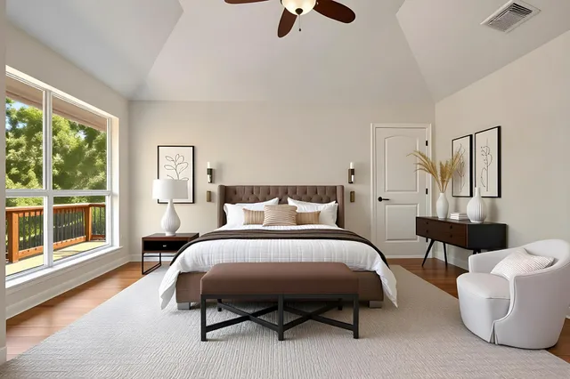 a spacious bedroom with a bed and window