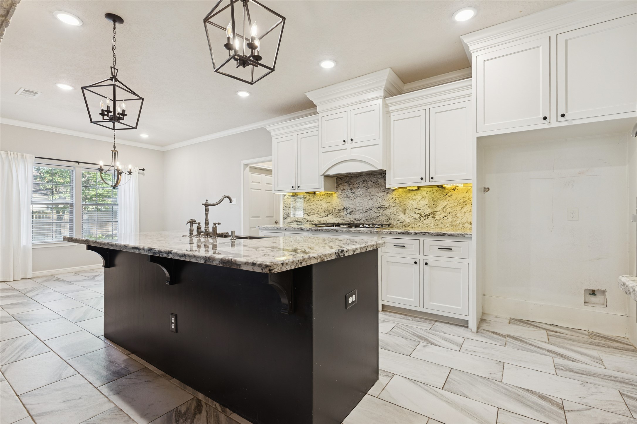 21724 Stargrass Drive Spring, TX 77388 - Photo 12 of 50 a kitchen with stainless steel appliances granite countertop a sink a stove and cabinets