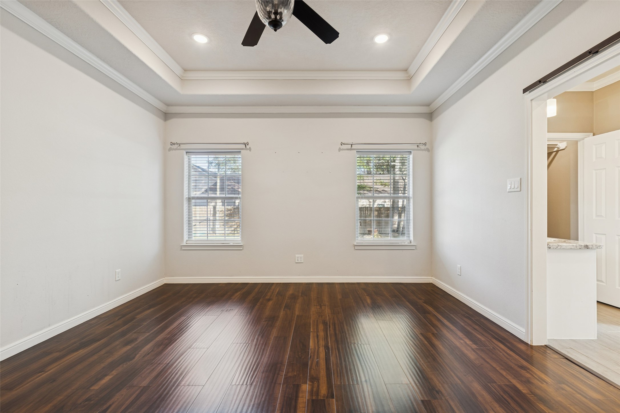 21724 Stargrass Drive Spring, TX 77388 - Photo 22 of 50 wooden floor in an empty room with a window