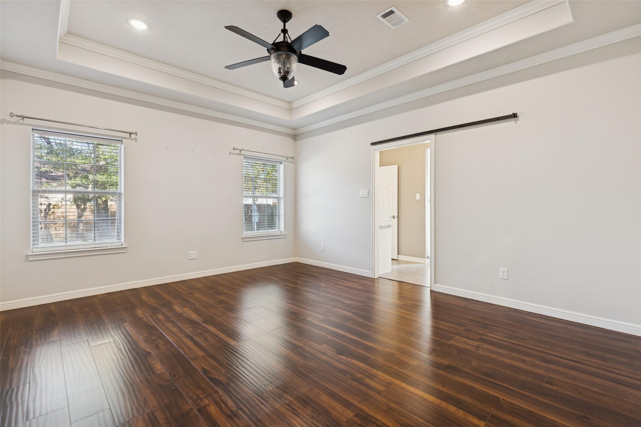 21724 Stargrass Drive Spring, TX 77388 - Photo 23 of 50 a view of empty room with wooden floor and fan