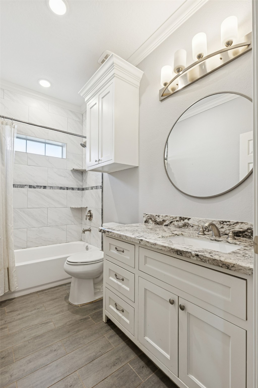 21724 Stargrass Drive Spring, TX 77388 - Photo 34 of 50 a bathroom with a sink a toilet and bathtub