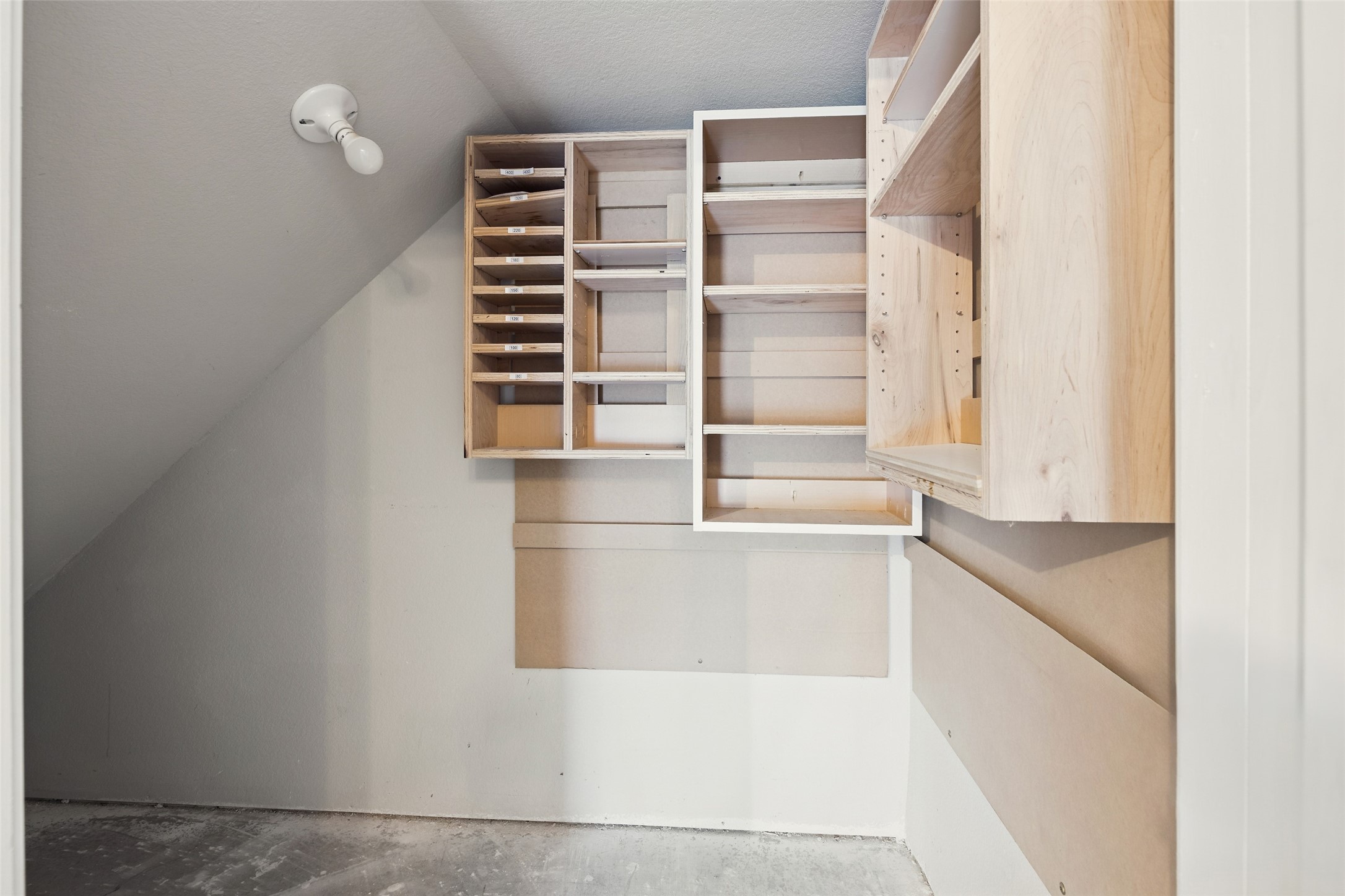 21724 Stargrass Drive Spring, TX 77388 - Photo 42 of 50 a view of walk in closet with empty racks