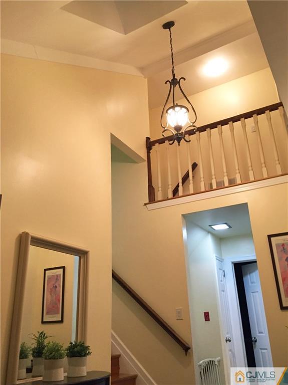 16 Clive Hills Road Edison, NJ 08820 - Photo 3 of 25 a view of a hallway with entryway