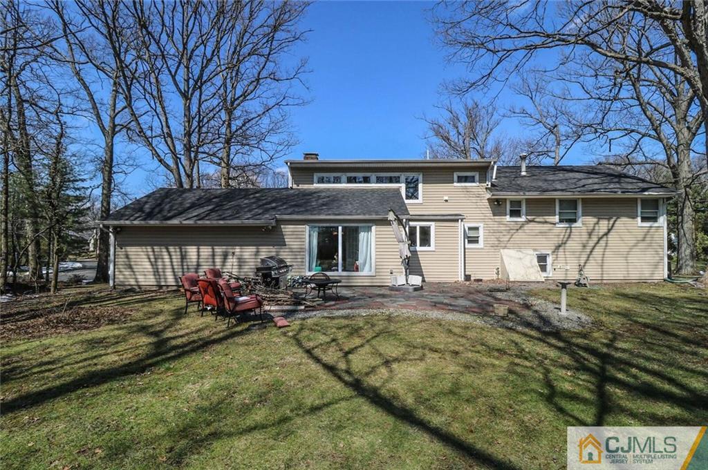 16 Clive Hills Road Edison, NJ 08820 - Photo 25 of 25 a front view of a house with garden