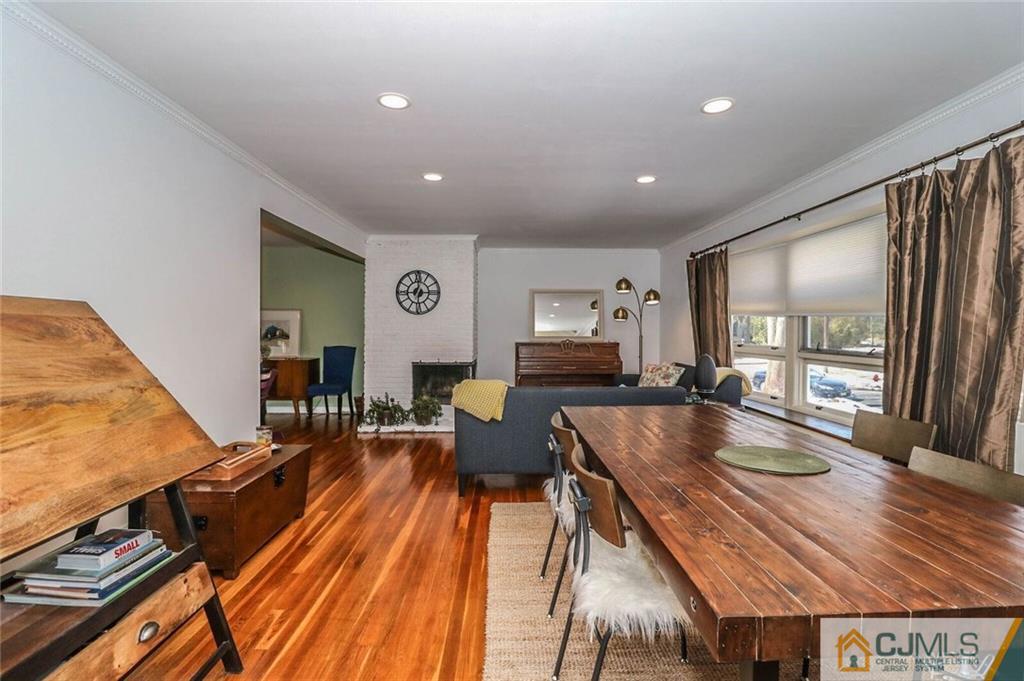 16 Clive Hills Road Edison, NJ 08820 - Photo 4 of 25 a living room with furniture and a wooden floor