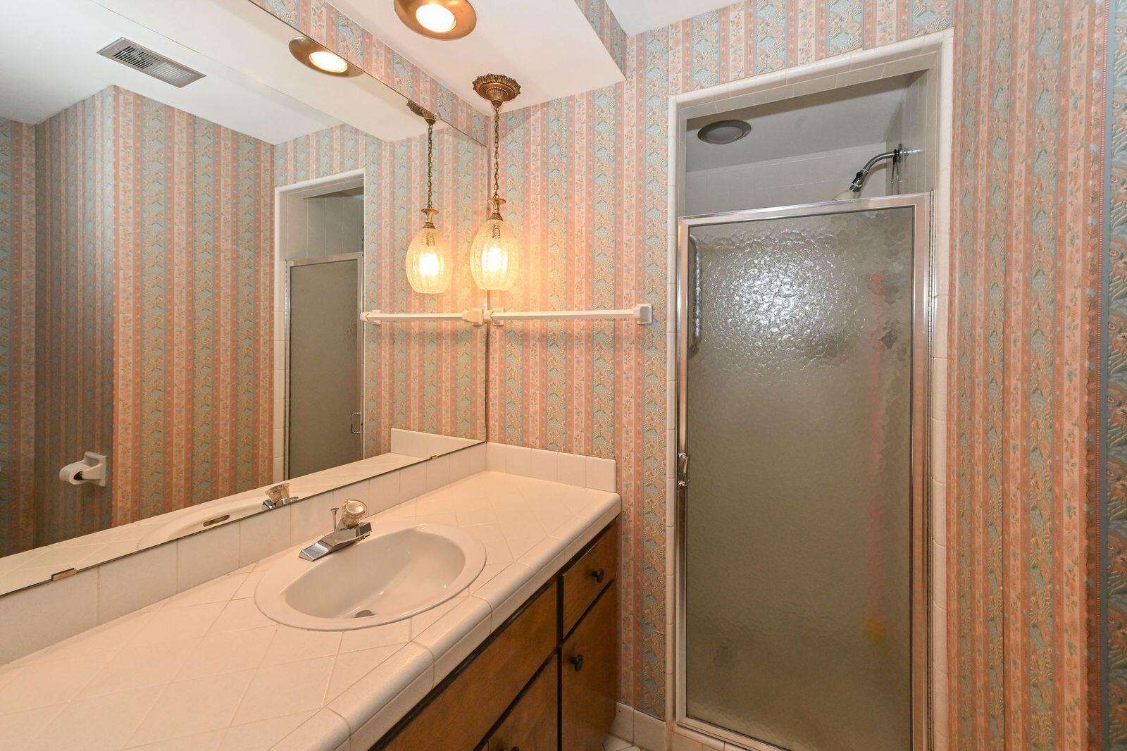 7693 Overlook Drive Greendale, WI 53129 - Photo 12 of 16 7693 Overlook primary room bath