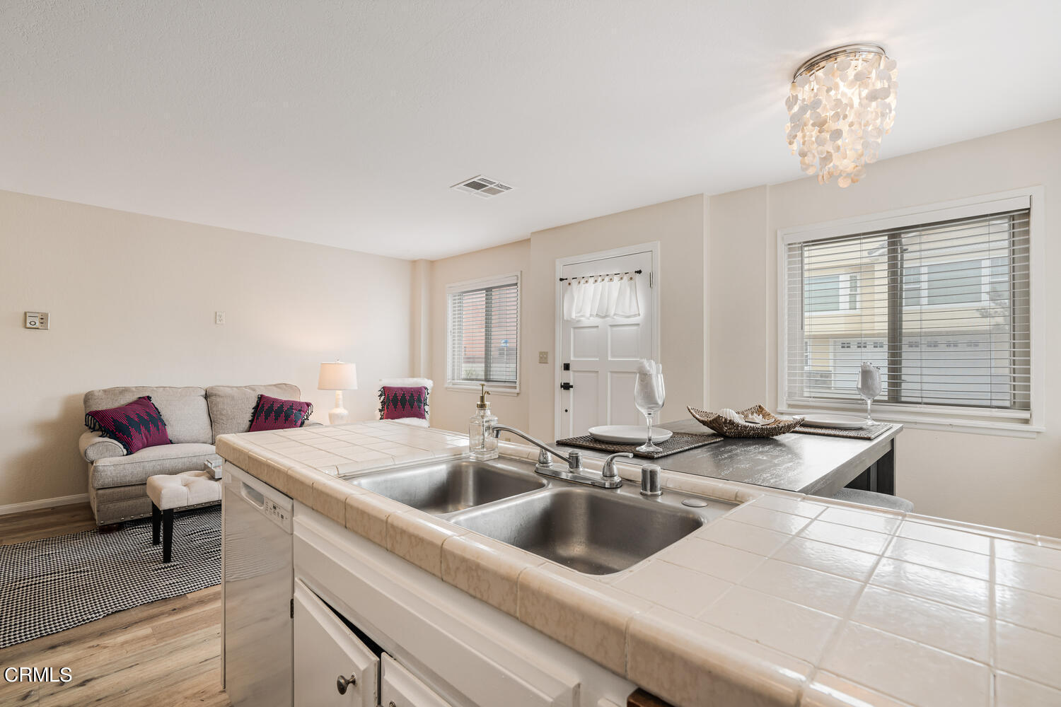 3700 Ocean Drive Oxnard, CA 93035 - Photo 40 of 55 a kitchen with a sink and cabinets