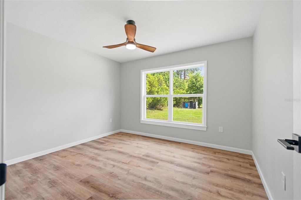 1730 Berrybush Street Bunnell, FL 32110 - Photo 25 of 43 an empty room with a window