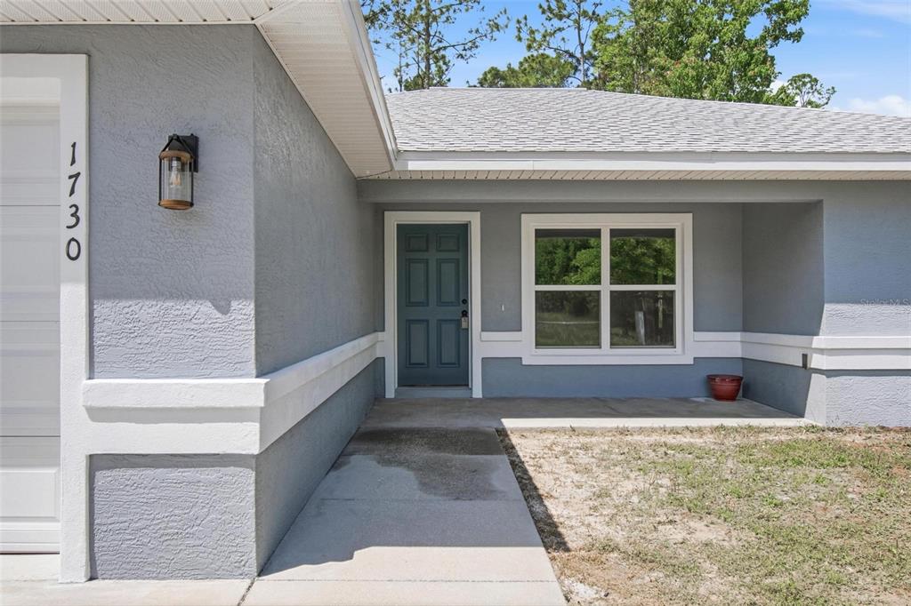 1730 Berrybush Street Bunnell, FL 32110 - Photo 3 of 43 a view of entrance of house