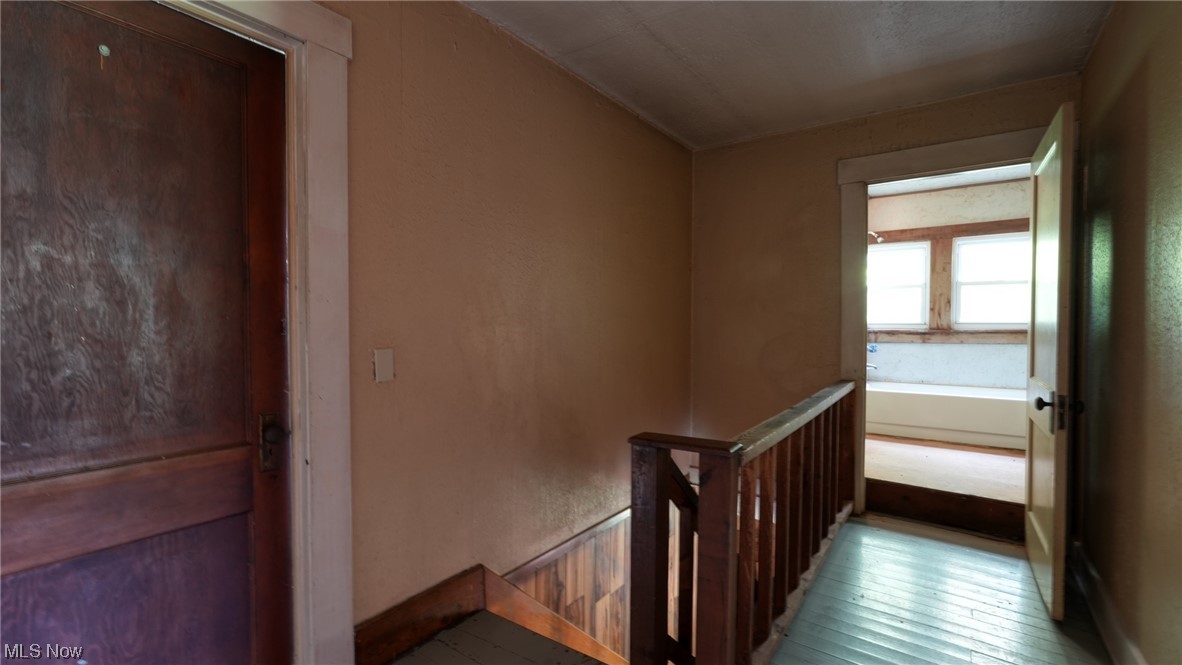40862 Rado Ridge Road Caldwell, OH 43724 - Photo 15 of 35 Stairs featuring light hardwood flooring