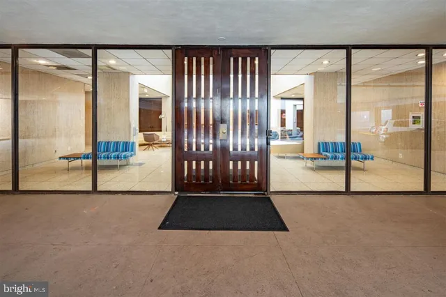 a view of an empty room and window