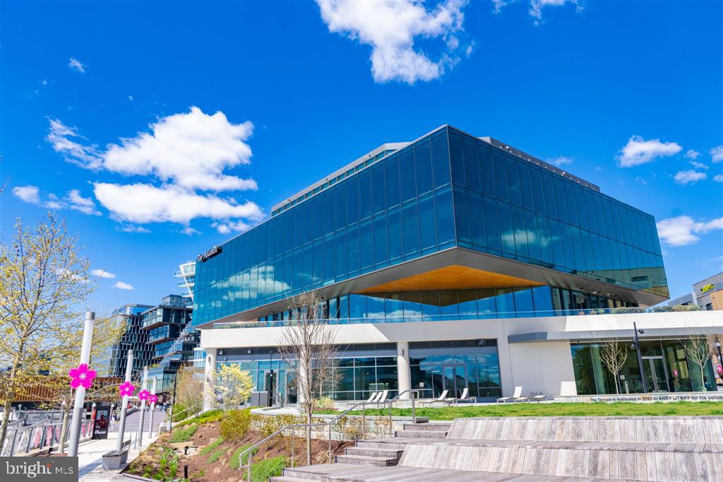 1425 4th Street Southwest, Unit A712 Washington, DC 20024 - Photo 27 of 38 a view of large building with a yard