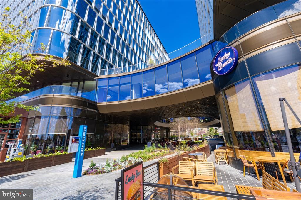 1425 4th Street Southwest, Unit A712 Washington, DC 20024 - Photo 37 of 38 a view of a cafe with outdoor space