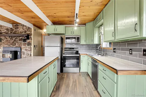 a view of a livingroom with a fireplace