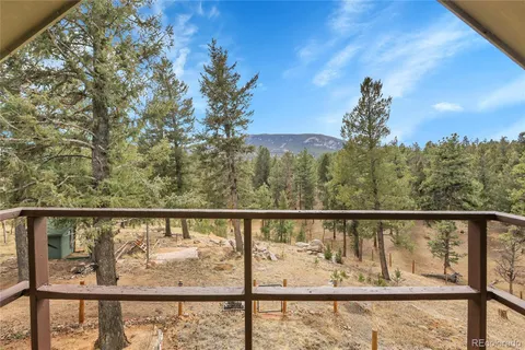 a view of road with trees