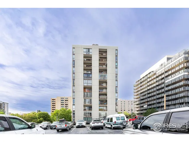 a cars parked in front of a building