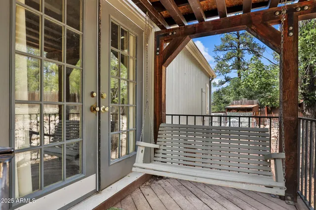 a view of a backyard with sitting area
